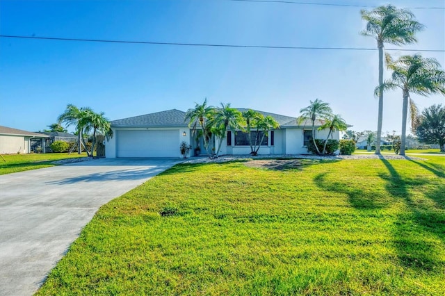 ranch-style house featuring a garage and a front lawn