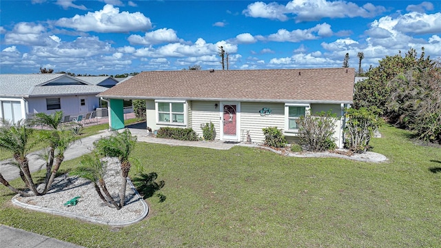 ranch-style home with a front yard