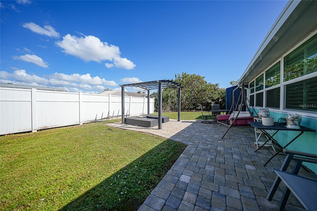 view of yard with a patio area and a pergola