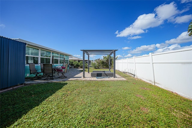 view of yard with a patio area and a jacuzzi