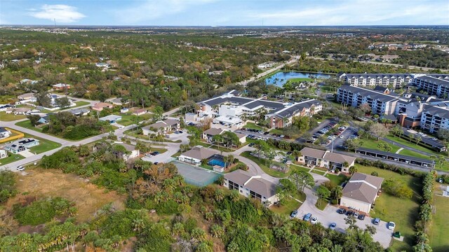 bird's eye view with a water view