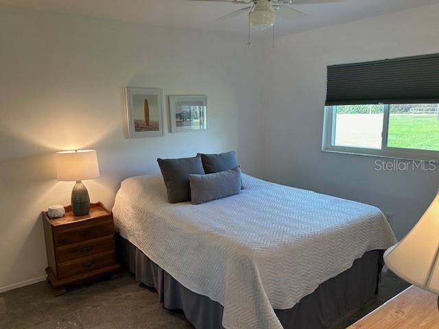 bedroom featuring ceiling fan