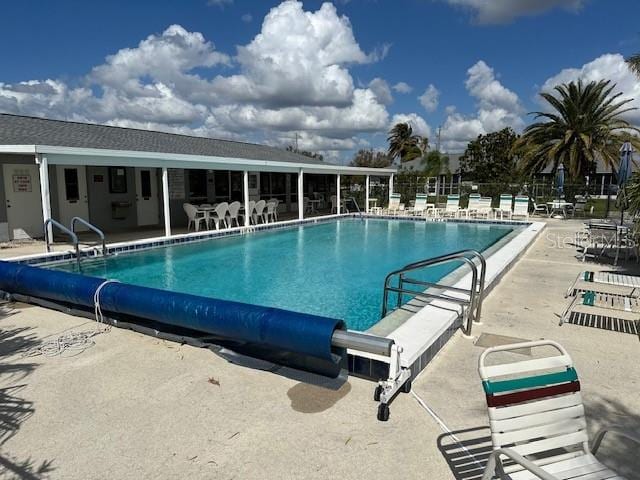 view of pool with a patio area