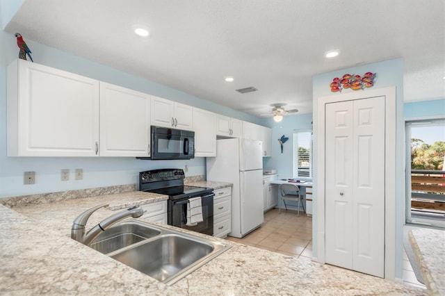 kitchen with white cabinetry, sink, ceiling fan, and black appliances