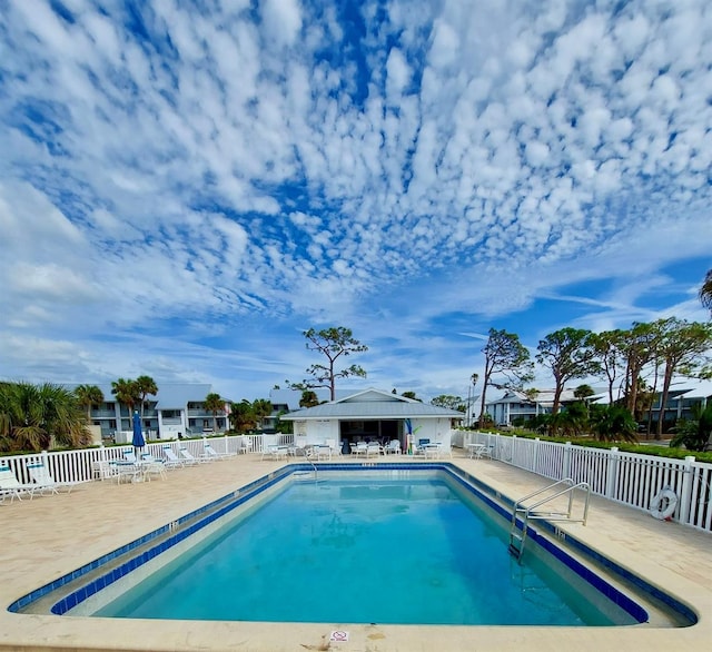 view of pool featuring a patio area