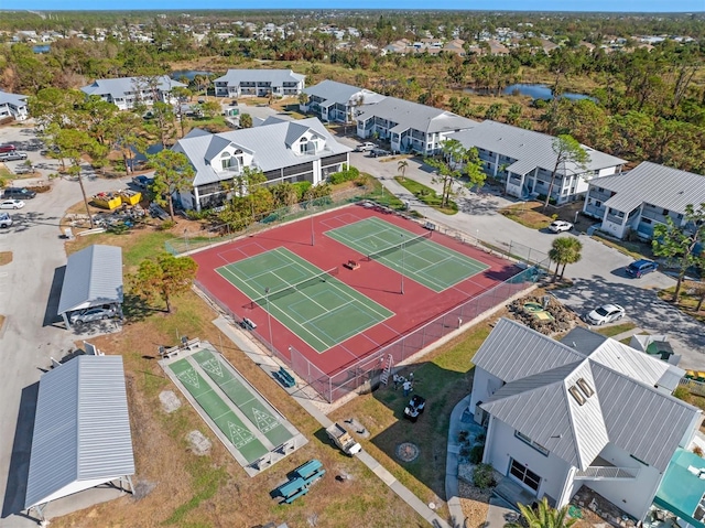 aerial view featuring a water view and a residential view