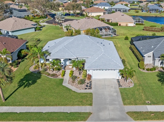 aerial view featuring a water view