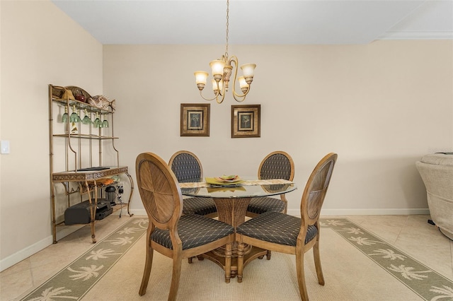 dining room with crown molding, light tile patterned flooring, and a notable chandelier