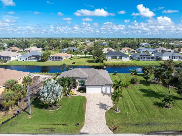 drone / aerial view with a water view