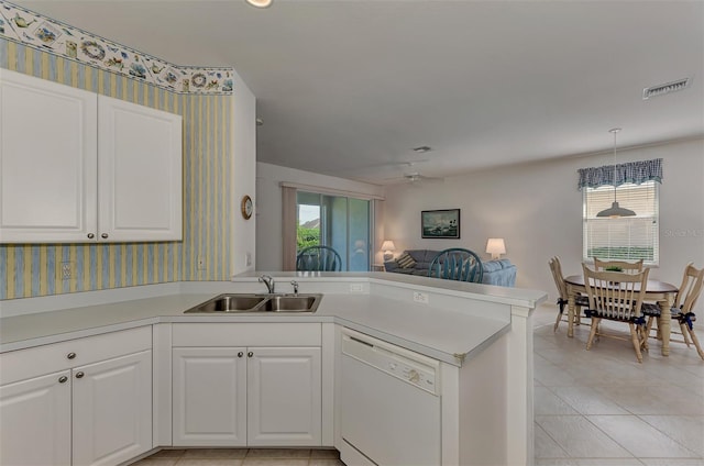 kitchen featuring dishwasher, white cabinets, kitchen peninsula, and ceiling fan