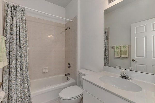 full bathroom featuring vanity, toilet, and shower / tub combo