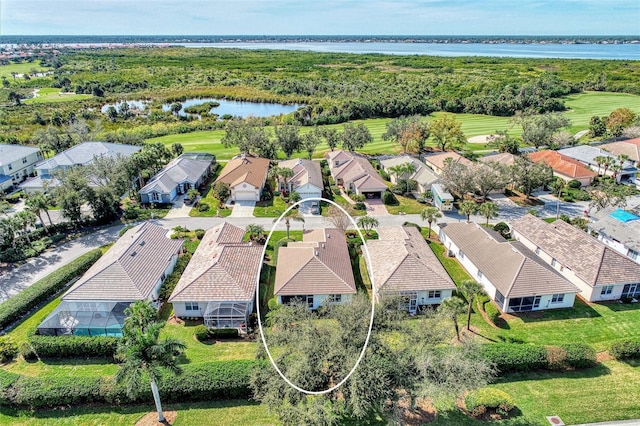 drone / aerial view featuring a water view