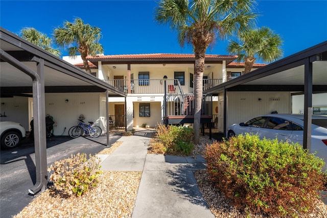 view of front of property with a balcony