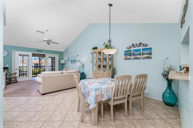 dining room featuring french doors, light tile patterned flooring, high vaulted ceiling, and ceiling fan