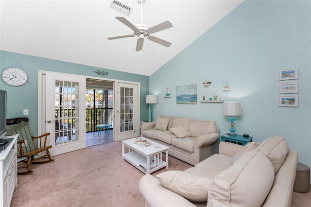 living room featuring french doors, light carpet, high vaulted ceiling, and ceiling fan