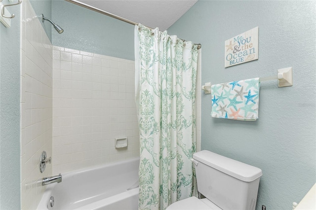 bathroom featuring shower / bath combination with curtain and toilet