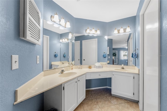 bathroom with vanity and tile patterned floors