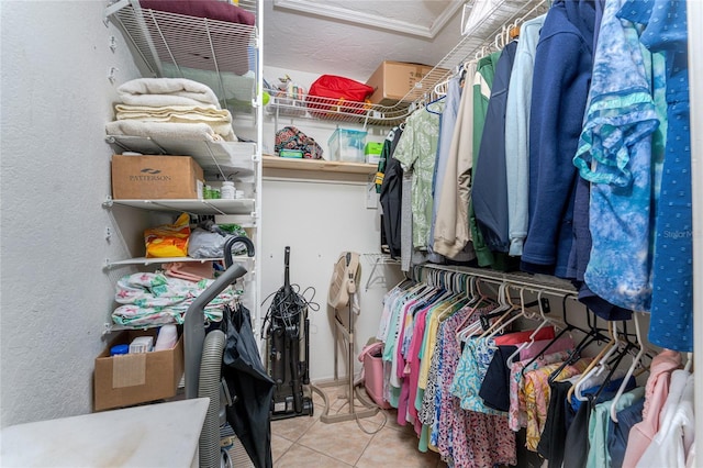 404 Pine Hollow Cir Unit 404, Englewood, FL 34223 - spacious closet featuring tile patterned flooring