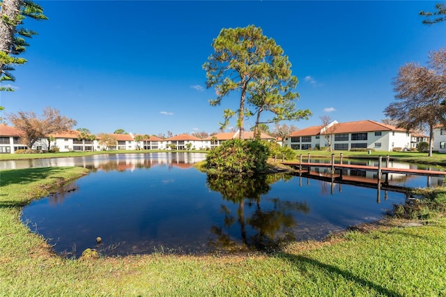 404 Pine Hollow Cir Unit 404, Englewood, FL 34223 - dock with a residential view and a water view