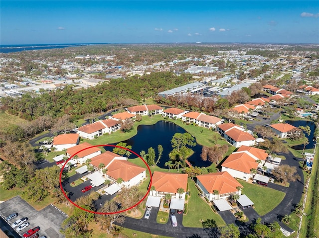 404 Pine Hollow Cir Unit 404, Englewood, FL 34223 - aerial view of property's location featuring a large body of water and nearby suburban area