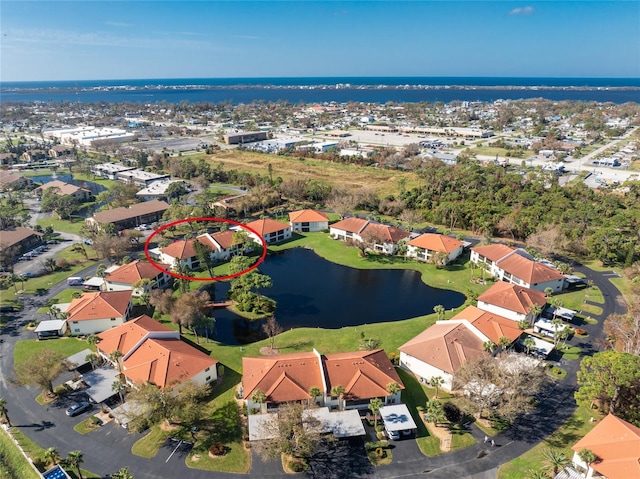 404 Pine Hollow Cir Unit 404, Englewood, FL 34223 - aerial overview of property's location with a nearby body of water and nearby suburban area