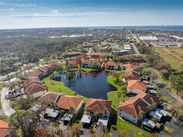 drone / aerial view with a water view