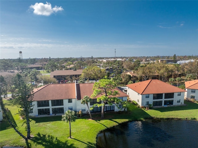 drone / aerial view with a water view