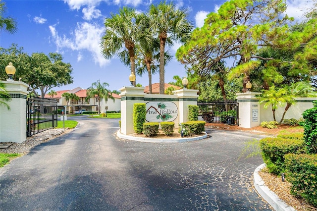 404 Pine Hollow Cir Unit 404, Englewood, FL 34223 - community sign featuring a gate