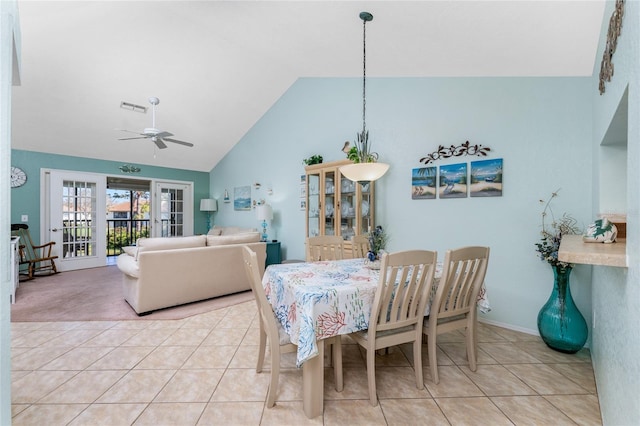 dining space featuring high vaulted ceiling, light tile patterned flooring, and ceiling fan