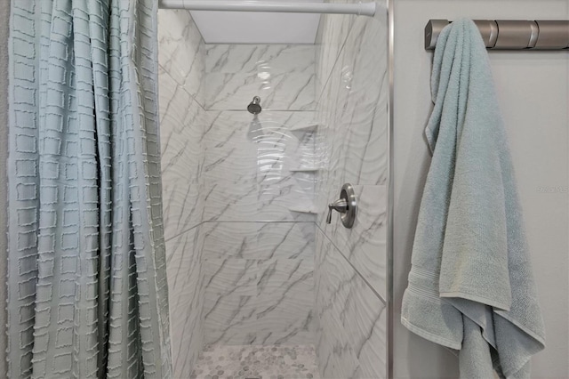 bathroom with a shower with curtain