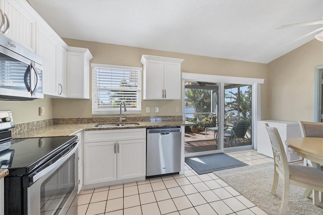 kitchen with white cabinetry, sink, and stainless steel appliances