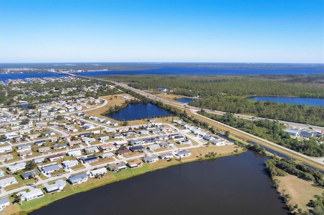 drone / aerial view with a water view