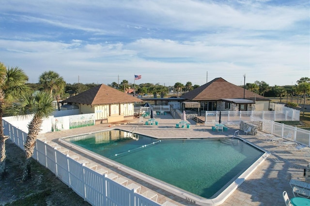 view of swimming pool featuring a patio area