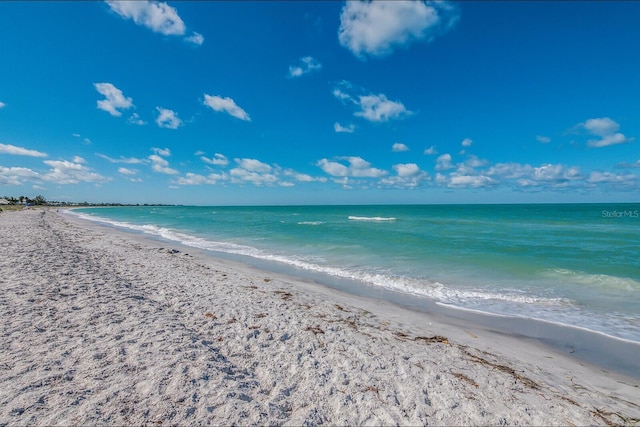 property view of water featuring a beach view