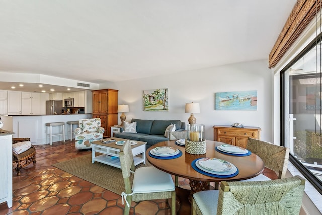 living room with visible vents and recessed lighting