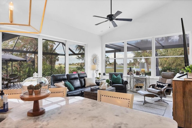 sunroom with lofted ceiling and ceiling fan