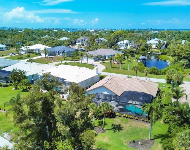 drone / aerial view with a water view