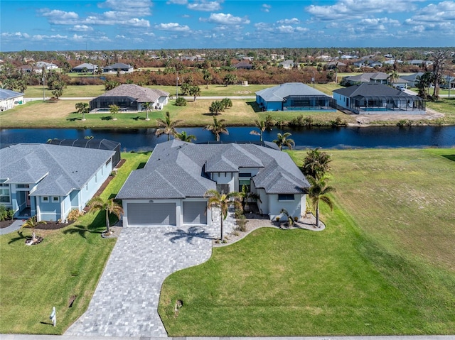 drone / aerial view with a water view