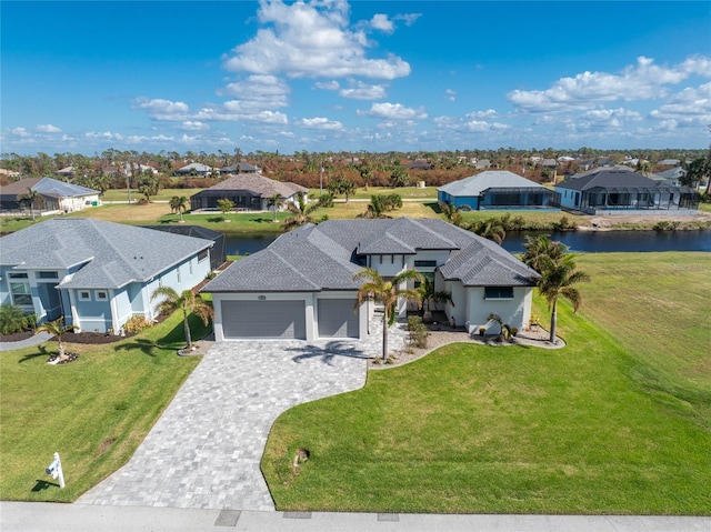 drone / aerial view featuring a water view