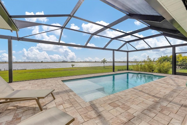 view of swimming pool featuring a patio area, a lanai, a yard, and a water view