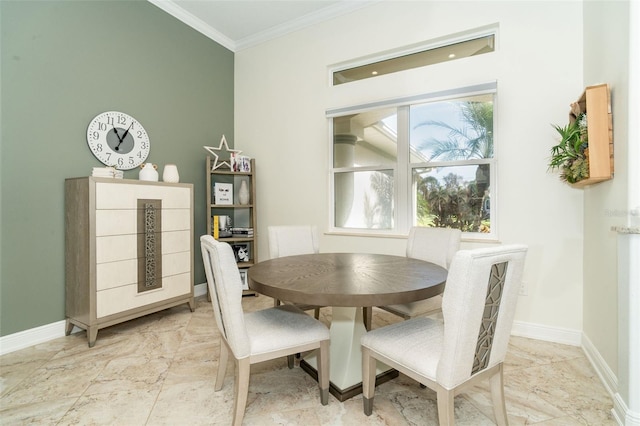 dining room featuring ornamental molding