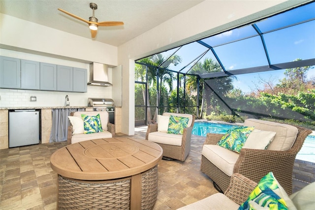 view of patio featuring an outdoor hangout area, a lanai, exterior kitchen, and area for grilling