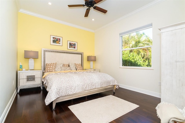 bedroom featuring dark wood-type flooring, ceiling fan, and ornamental molding