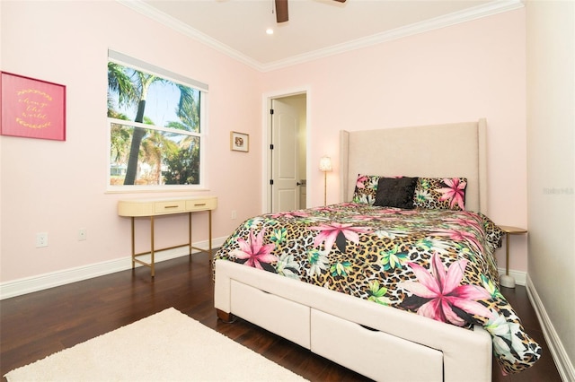 bedroom featuring crown molding, dark wood-type flooring, and ceiling fan