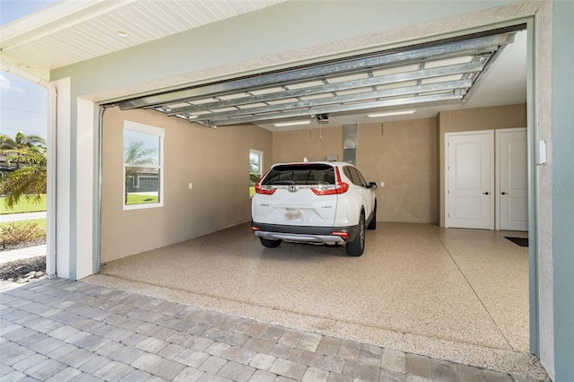 view of vehicle parking featuring a carport