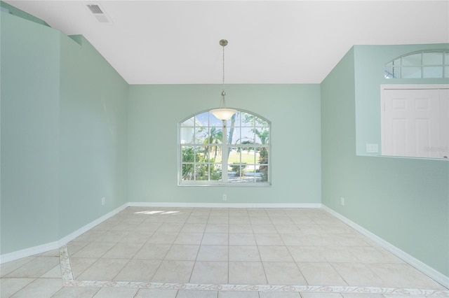 unfurnished dining area featuring light tile patterned floors