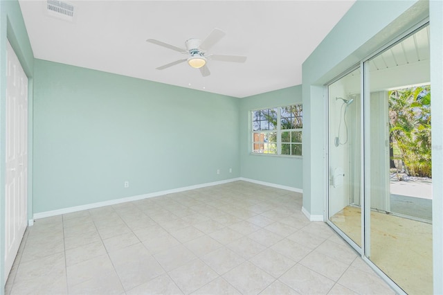 spare room with ceiling fan