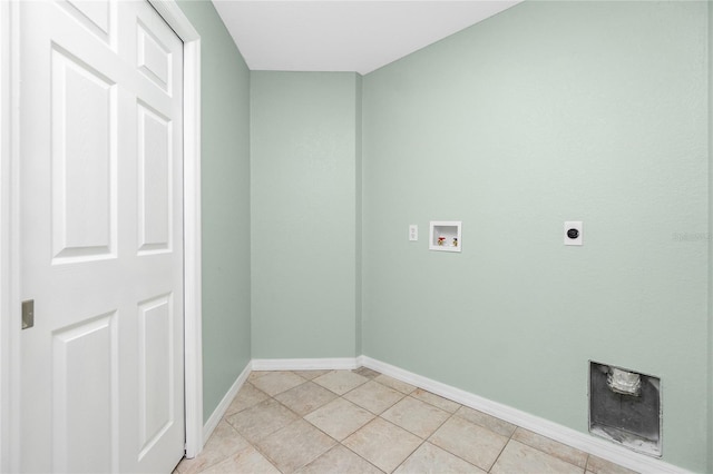 washroom featuring hookup for an electric dryer, washer hookup, and light tile patterned floors