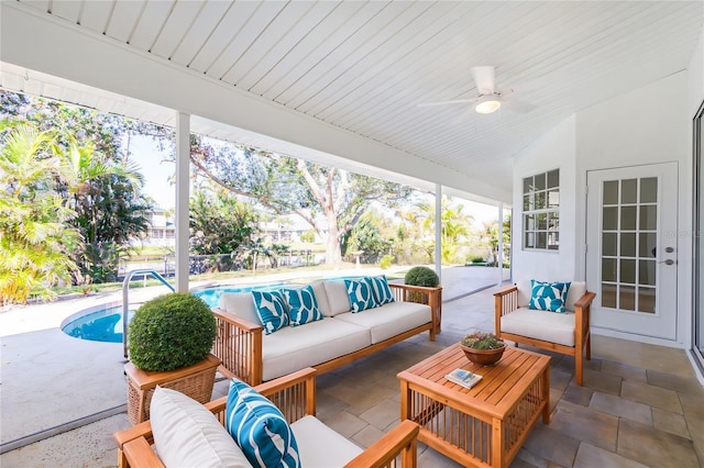 217 Rotonda Cir, Rotonda West, FL 33947 - view of patio with an outdoor living space, a ceiling fan, and an outdoor pool