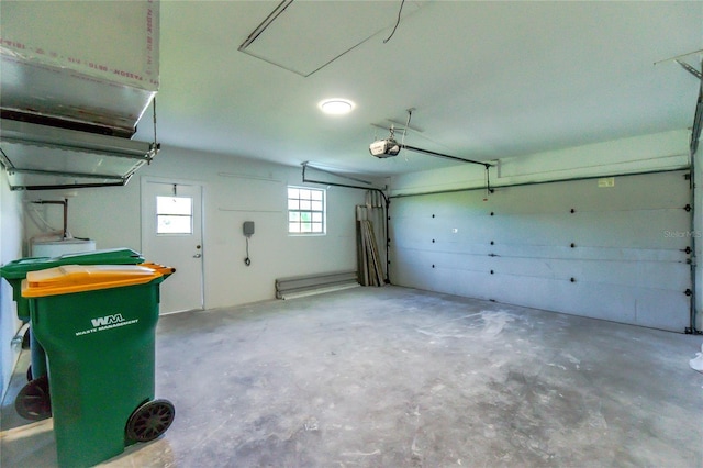 217 Rotonda Cir, Rotonda West, FL 33947 - garage featuring a garage door opener